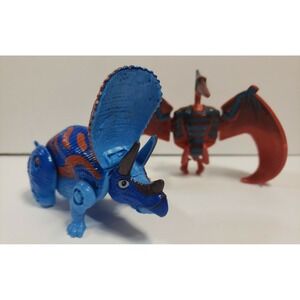 Dino Egg -­ Pteranodon & Triceratops Mini Tranforming Dinosaurs
